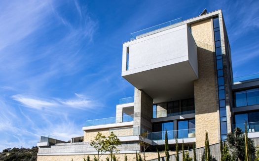 Luxury six-bedroom villa for sale in Limassol Cyprus with modern architecture, large balconies and bright exterior
