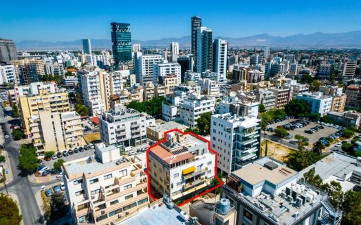 Four storey mixed-use building in Agioi Omologites, Nicosia